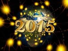 imagen de la bola del mundo con el año 2015 sobrepuesto con destellos dorados